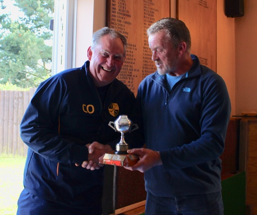 David Chard presents President Chris Odgers with the Grundy Cup