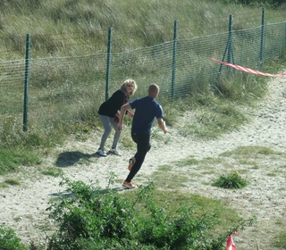 Chris 'Scotty' powering along towards the next dune, being encouraged by an onlooker (who happened to belong to Havant AC many moons ago).